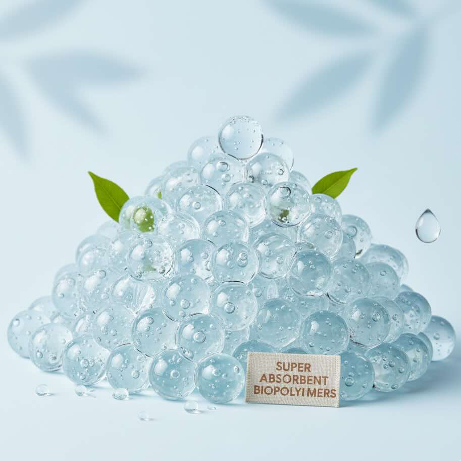 Clear gel beads piled up, labeled Super Absorbent Biopolymers